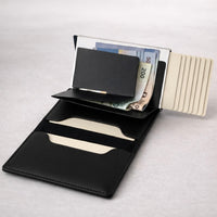 MONSAFE Wallet Pop-Up Negro | Protección RFID · Piel Sintética Premium